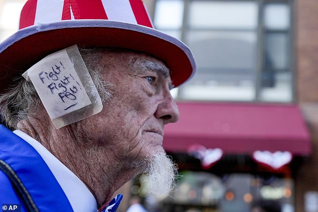 A supporter wears an earband in solidarity with former President Donald Trump