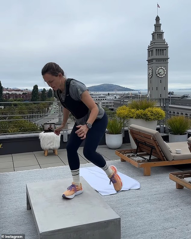 The first photo showed a glimpse of Garner in a brown sweater, blue jeans and white sneakers as she stood smiling on a balcony overlooking the San Francisco Ferry Building