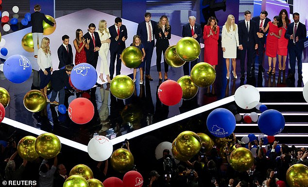 Donald Trump is joined on stage by his wife Melania and members of his family