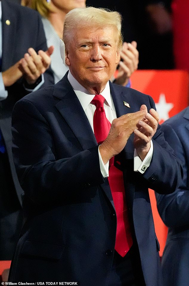 Donald Trump applauds during the final day of the Republican National Convention at the Fiserv Forum