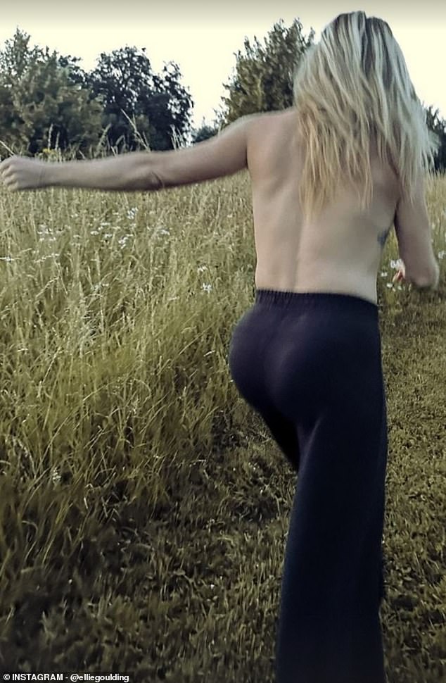 The Higher Than Heaven singer posed in little more than a pair of navy sweatpants as she jogged through the grass in the sexy photos