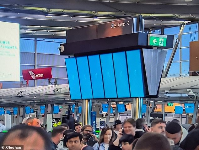 Chaos broke out at major Australian airports as flight information boards failed