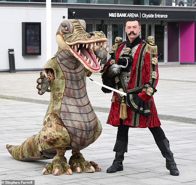 Kai put on a brave face, donning his Captain Hook costume and posing alongside his fellow cast members who will be joining him on stage at the city's M and S Bank Arena this Christmas