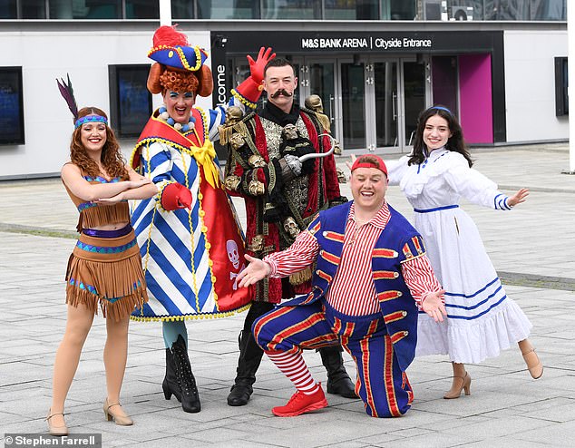 The Strictly star posed confidently in character, holding up his hook hand while also branding a sword