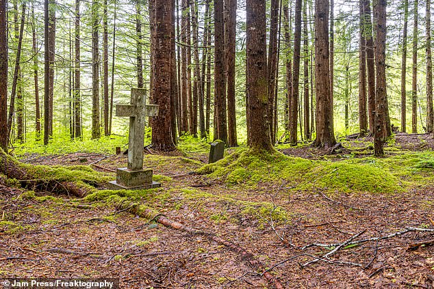 Dave says one of the creepiest places in Anyox is the cemetery. At one point he finds a gravestone from 1935 of a man who died at the age of 70