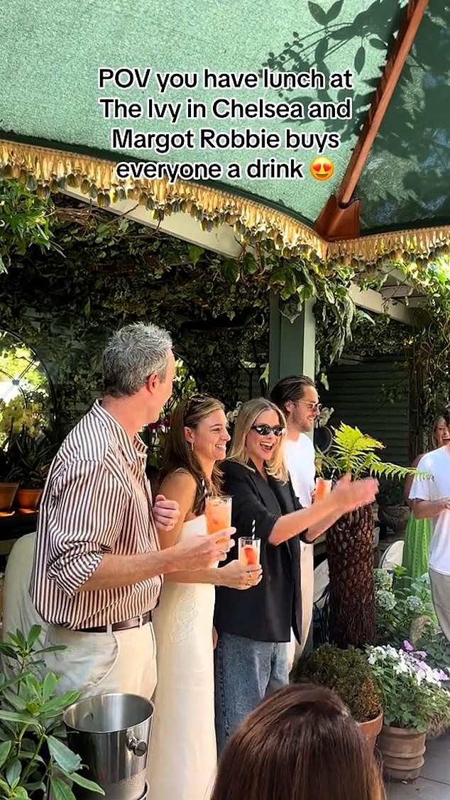 The Australian actress, 34, was filmed mingling with staff and waving and clapping to the crowd as she enjoyed the blistering heatwave