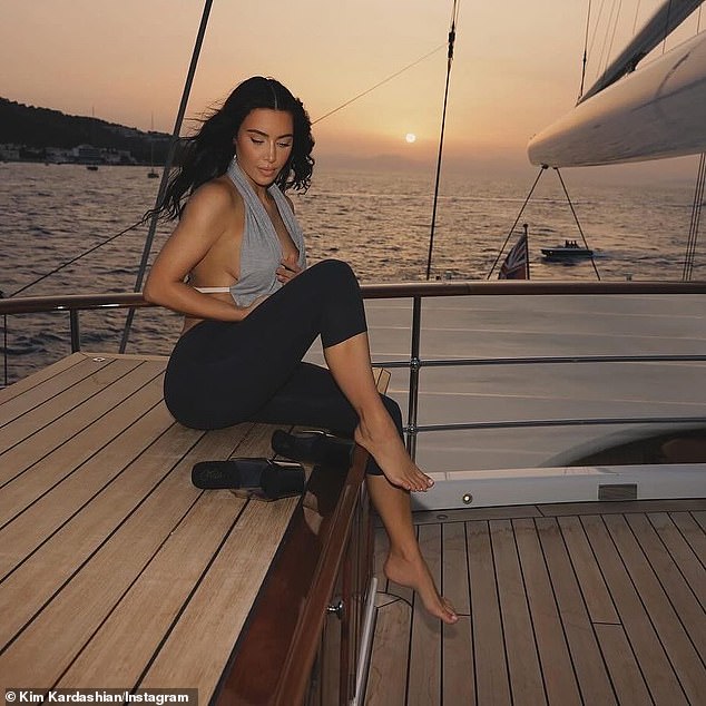 Kim Kardashian posted a photo on Instagram earlier this month of herself enjoying the sunset aboard a yacht