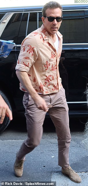 The Canadian actor wore the top over a white shirt and paired it with khaki pants and a pair of brown suede shoes