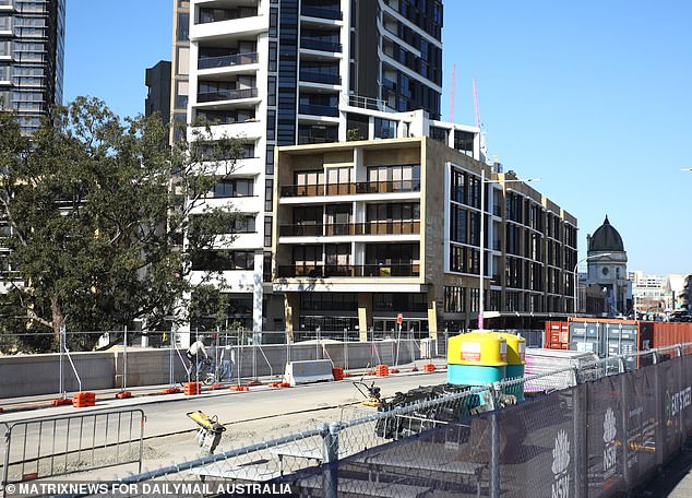 Apartment builders in particular are struggling as Australians prefer to live in houses as developers struggle with declining margins (pictured is a construction site in Parramatta, Sydney)