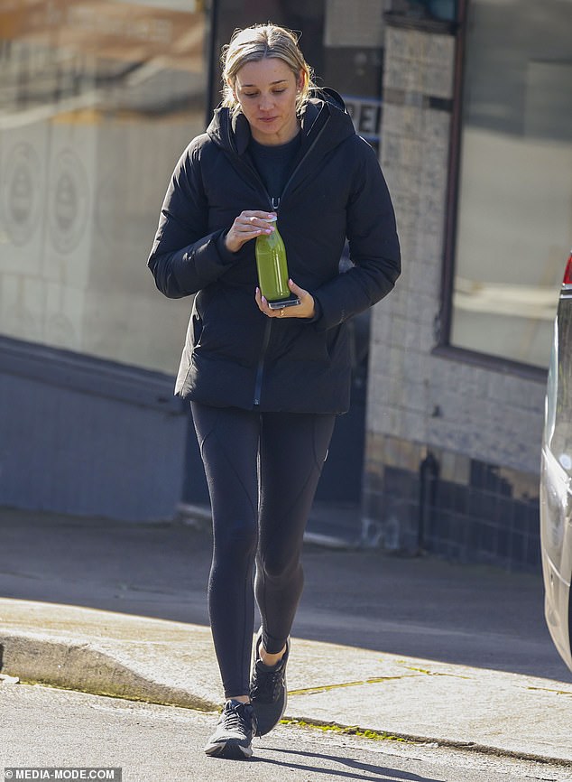 The shoe designer went outside for a green juice on a cold day in Sydney