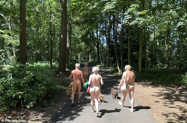 Austin says: 'I tried to spend as much time naked as possible. I would greet clients naked. It didn't bother me. I lived the lifestyle and got involved.' Above - guests enjoying the woodland walks on the site