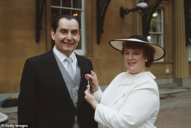 Reardon, pictured with his first wife Sue, receives his MBE at Buckingham Palace in 1985