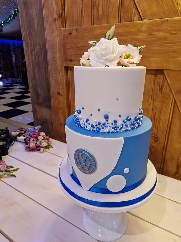 The blue and white Volkswagen camper van cake that the bride and groom had on their wedding day