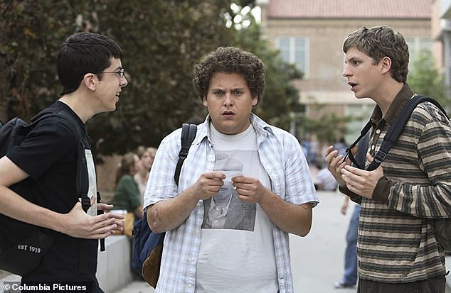 Cera, right, normally has brown hair; seen with Christopher Mintz-Plasse, left, and Jonah Hill, center, in 2007's Superbad