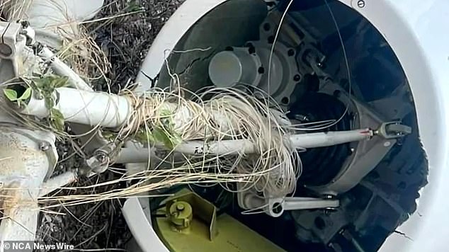 Local security authorities are investigating the crash that occurred during a Balinese kite-flying festival (pictured: kite string wrapped around the rotor)