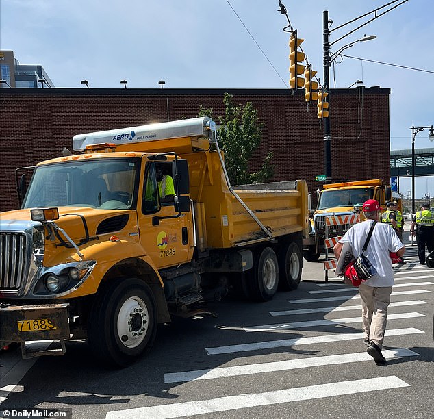 Trucks block streets around Van Andel Arena in Grand Rapids ahead of Donald Trump's rally on Saturday