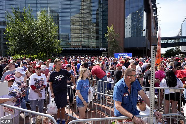 Trump supporters line up to enter Van Andel Arena. Security was beefed up for Trump's rally in Grand Rapids. It was the first campaign rally since the PA shooting a week earlier