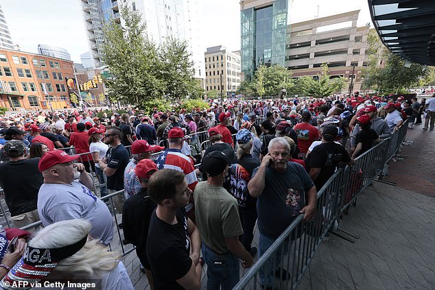 Supporters were not deterred by the shooting and lined up in their thousands