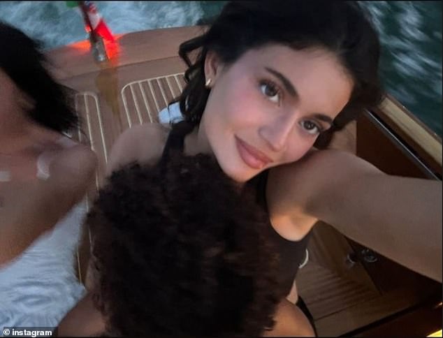 Jenner also shared a photo of her six-year-old daughter Stormi sitting on her lap, with only her head of curls visible