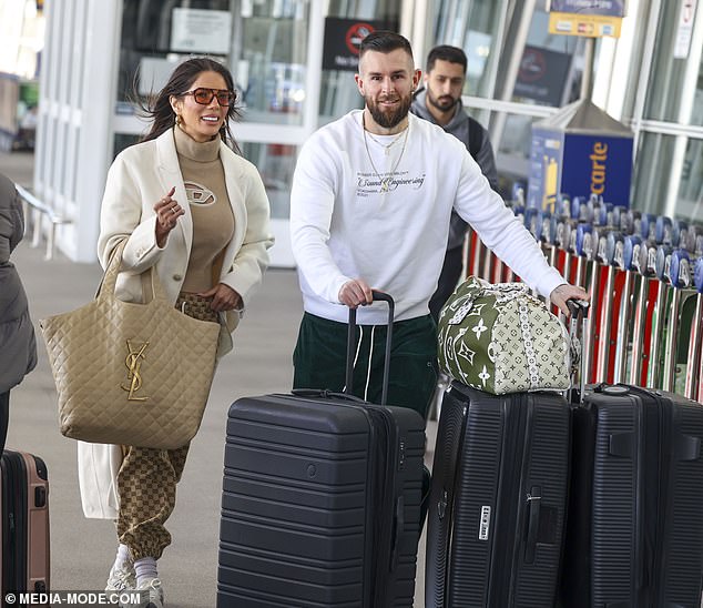 Amy, who founded and still runs fitness empire Acero with her ex Jono, completed her outfit with a pair of white trainers and oversized sunglasses