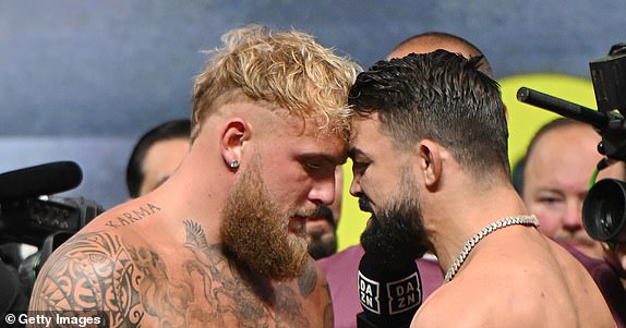 TAMPA, FLORIDA - JULY 19: Jake Paul and Mike Perry compete ahead of their Cruiserweight bout at Amalie Arena on July 19, 2024 in Tampa, Florida. (Photo by Julio Aguilar/Getty Images)