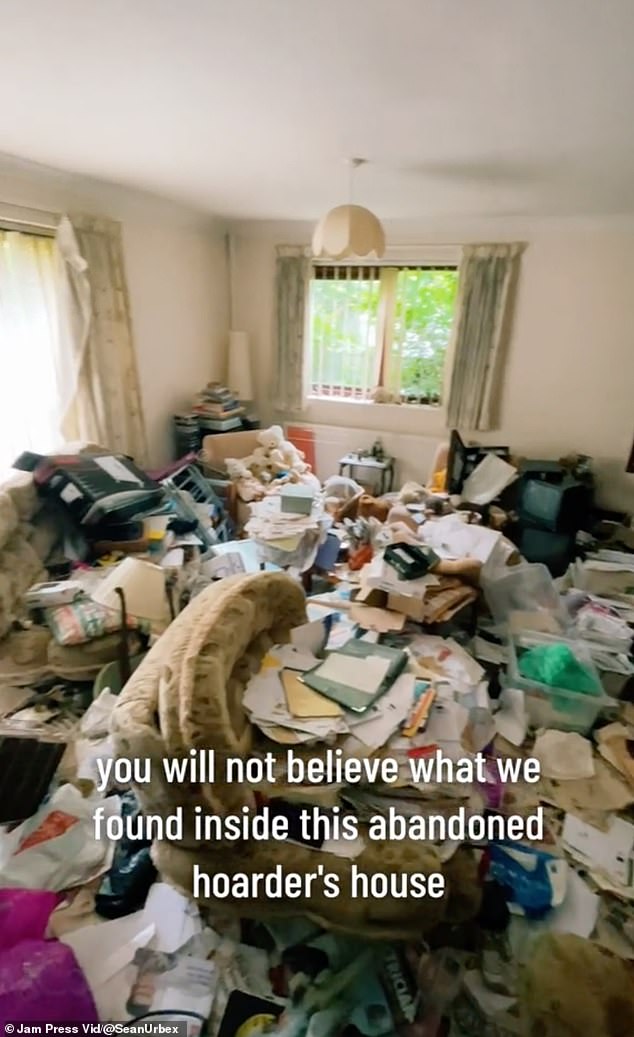 The living room floor was completely covered in what looked like piles of trash