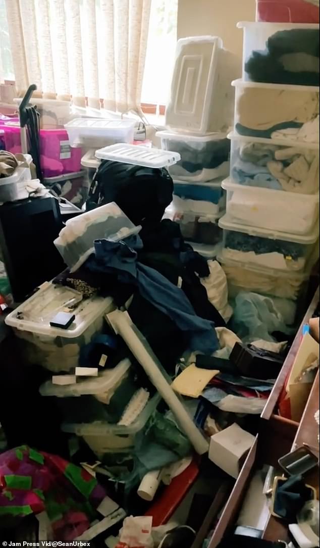 The rooms were filled with boxes of clothes, piled up to the ceiling