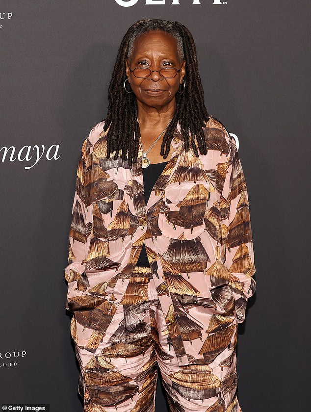 The talk show host looked stunning in a blush-colored shirt dress with hut patterns and matching pants