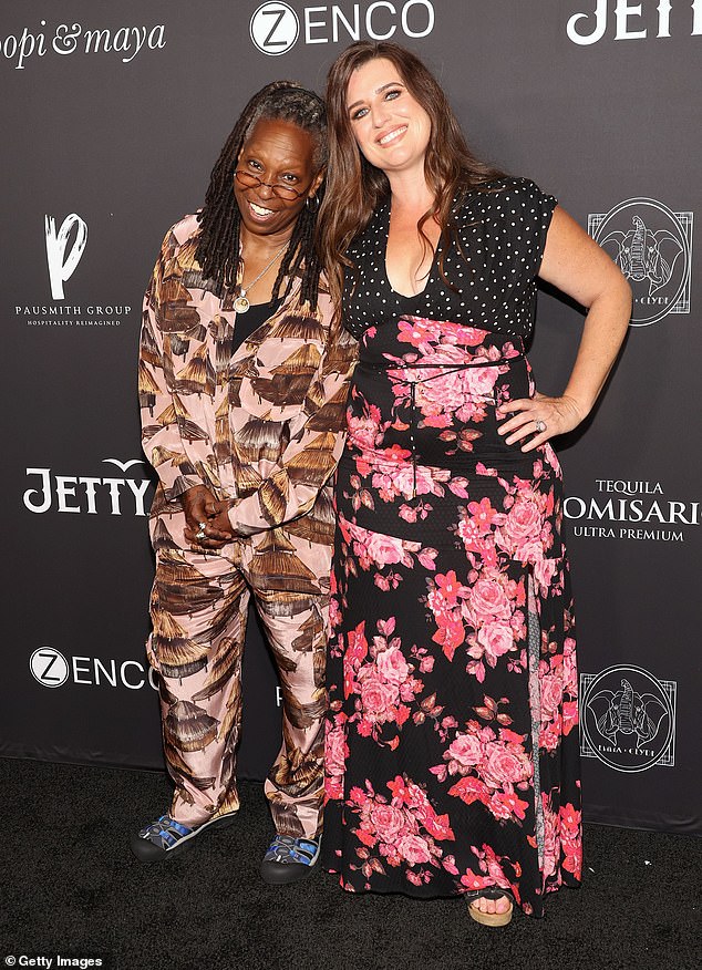 Maya Elisabeth looked stylish in a low-cut maxi dress with floral and polka dots as she walked the red carpet