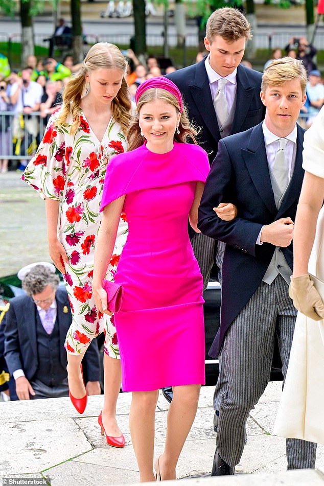 Princess Elisabeth's form-fitting dress featured a chic cape detail that covered her shoulders for this morning's religious ceremony