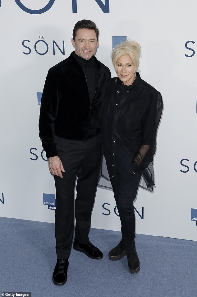 The Blessed actress attended the event alone after revealing she's enjoying her new single life following her split from husband Hugh Jackman (left)