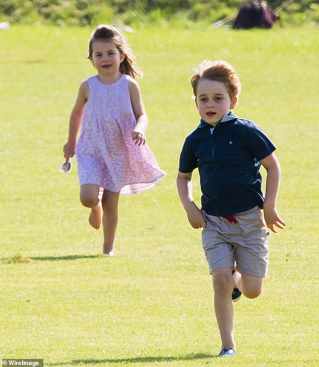 Charlotte runs barefoot after her brother George during a family day out at the polo in Beaufort Park, Gloucestershire, in 2018