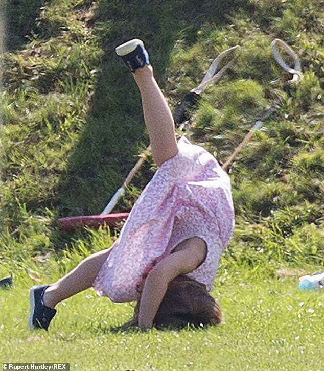 The young princess tries a headstand during the day out