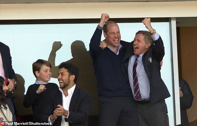 George celebrates Villa's first goal with his father during the Aston Villa v Nottingham Forest EPL match at Villa Park, Birmingham, in 2023