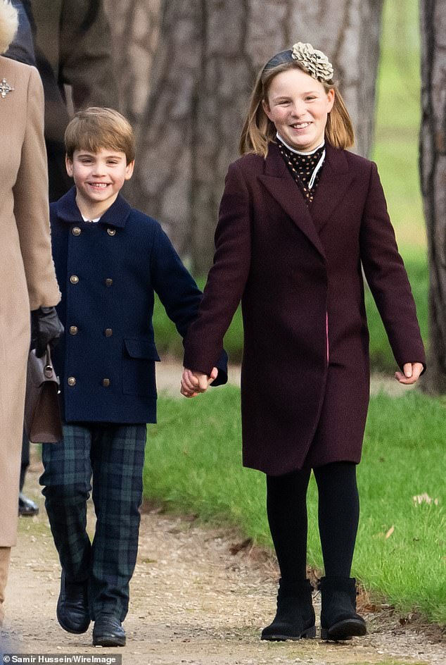 Louis and Mia Tindall, daughter of William's cousin Zara, walk hand-in-hand to the Christmas service at St Mary Magdalene Church in Sandringham, in 2023. William is Mia's godfather