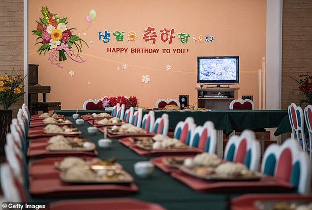 Food is prepared for a birthday celebration at Songdowon International School Children's Camp in 2018 in Wonsan, North Korea