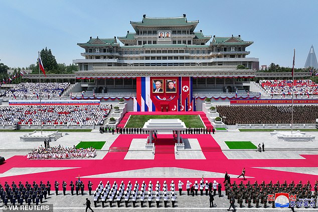 Pictured: Russian President Vladimir Putin and North Korean leader Kim Jong-un attend an official welcoming ceremony at Kim Il Sung Square in Pyongyang