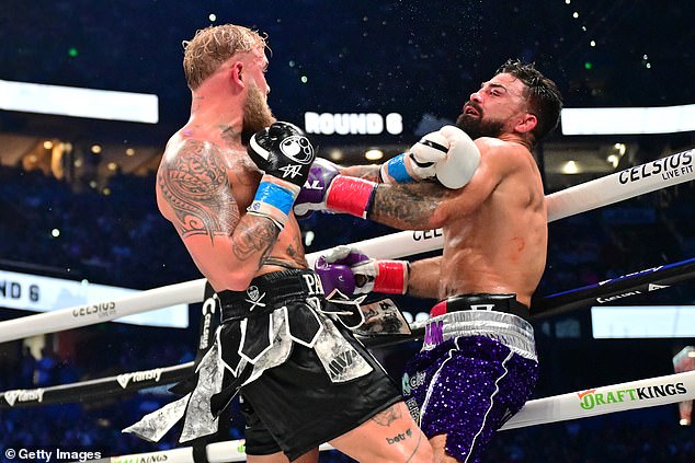 Jake Paul knocked out the energetic Mike Perry after six grueling rounds with the former UFC star