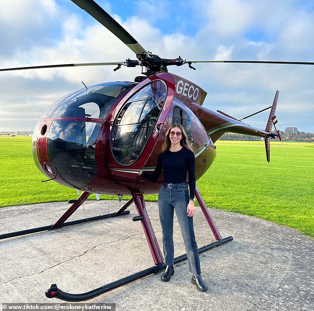 Katherine claimed that women in the industry are still 'very much in the minority' and often feel 'disconnected'. She is pictured above next to the Hughes 500C helicopter