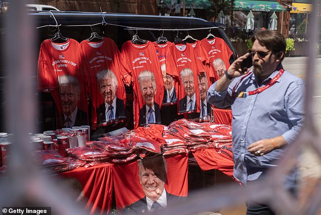 Trump merchandise sits on a vendor's table at the security checkpoint at the RNC