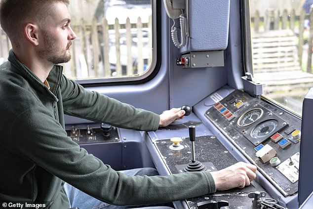 Drivers must sit behind the wheel and concentrate fully in their cabin, while checking everything on the train (File photo)