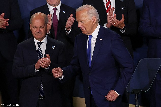 In Europe, German Chancellor Olaf Scholz (pictured left) said: 'My friend Joe Biden has achieved a lot: for his country, for Europe, for the world'