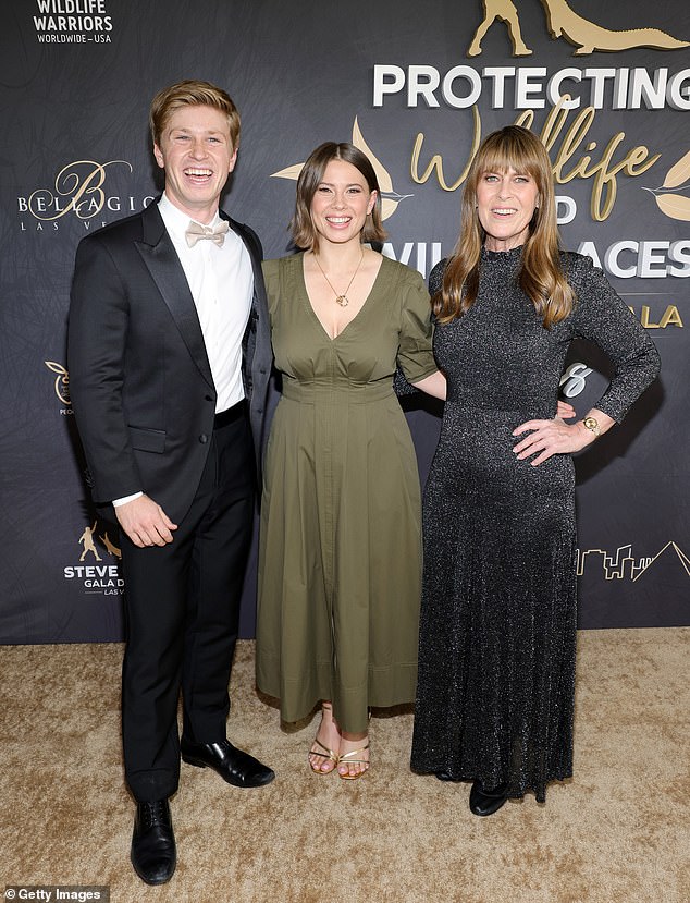 Robert said he had an extremely close bond with his family after losing his famous father Steve Irwin. Pictured: Robert on the red carpet with sister Bindi, 25, and his mother, Terri, 60, in May