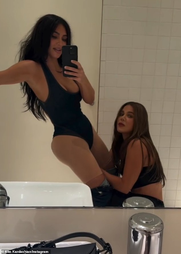 The mother of four filmed the fashion emergency in the mirror, wearing both the shapewear and her jeans, which were pulled up her legs, as Khloe tried to get the clasp to click