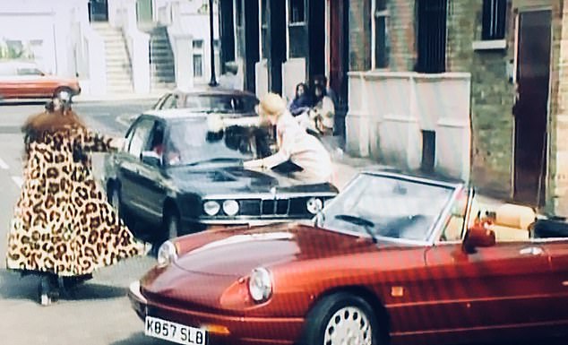 Jennifer Saunders and Joanna Lumley in Absolutely Fabulous, pictured next to the Alfa Romeo. In the episode, the car gets stuck when they park on the pavement, directly in front of Harvey Nichols