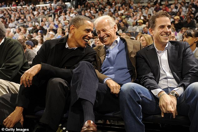 Biden and Obama attend a basketball game with Joe's son Hunter in 2010