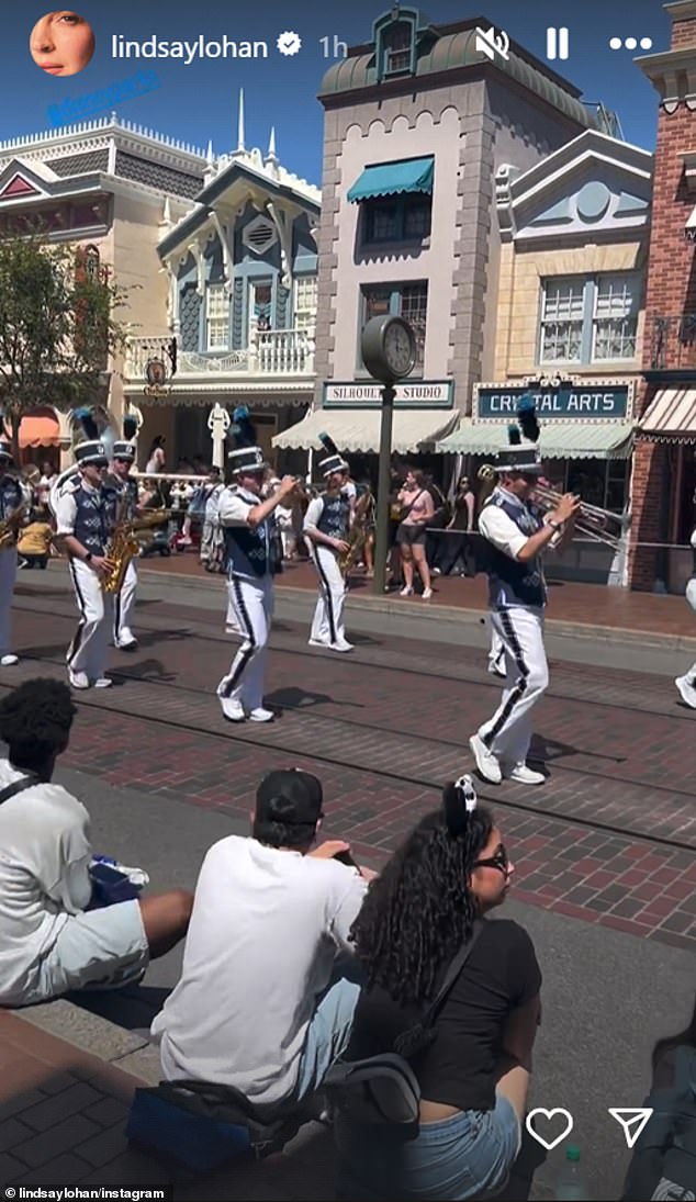 Lohan and company also watched the marching band do their thing for the fans