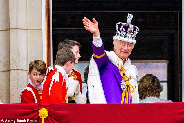 George looks back at the crowd on the balcony of Buckingham Palace on the day of the coronation of his grandfather, King Charles, May 6, 2023