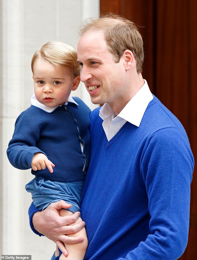 Prince William carries George to the Lindo Wing of St Mary's Hospital to visit Kate after Charlotte was born in 2015