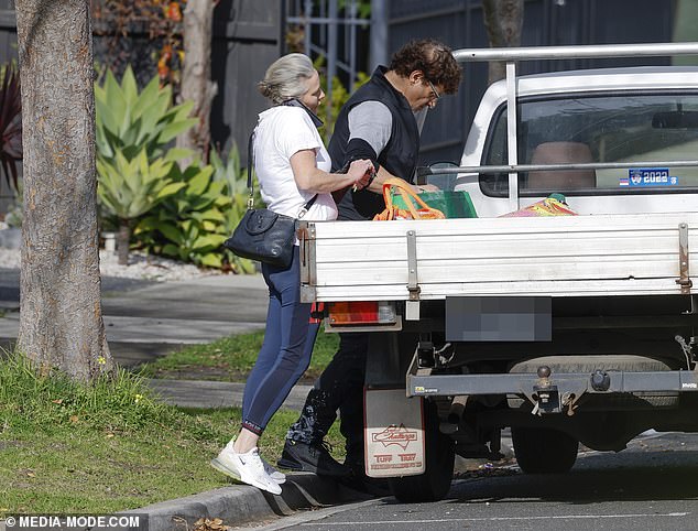 The 57-year-old arrived at the Melbourne address in a truck and was seen unloading items from the back while his mate gave him a hand